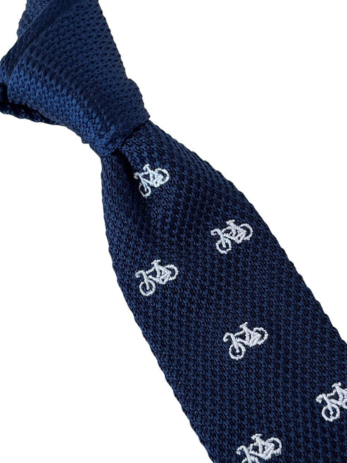 navy blue knitted tie with white embroidered bicycle bike design